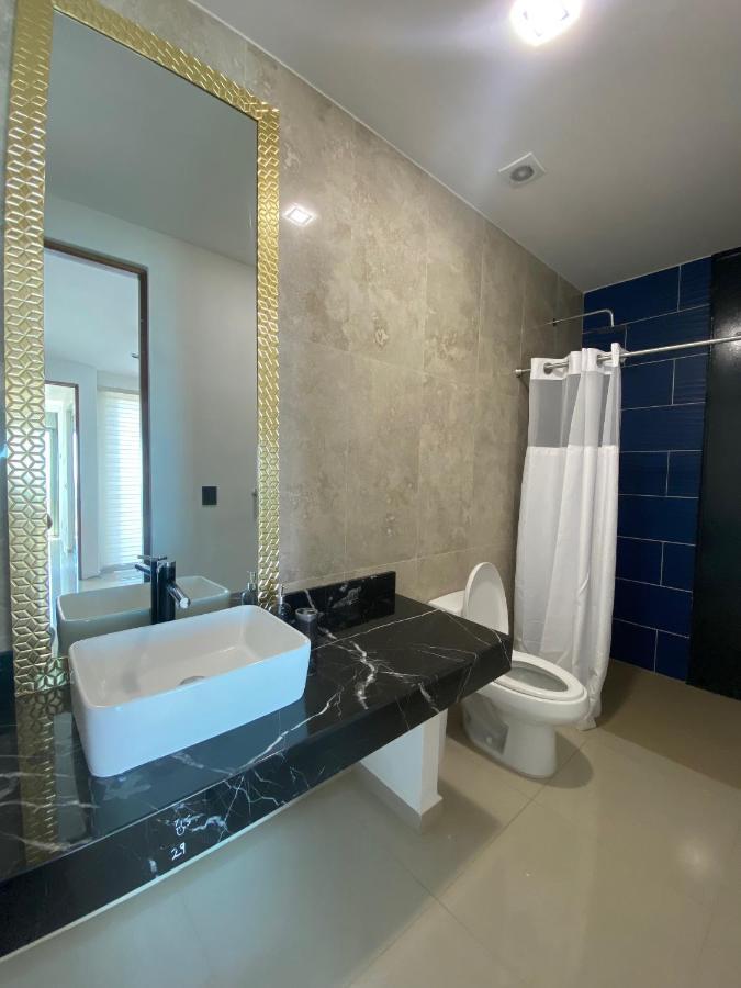 Angelina 28 Beachfront And Family Apartments - Modern And Relaxing Long Stays - 20 Min From Cancun Airport Puerto Morelos Dış mekan fotoğraf